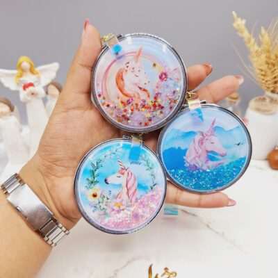 آینه شاین اکلیلی دایره ای طرح اسب تک شاخ به همراه آویز قفلی کد66007 - فروشگاه عمده لوازم آرایشی کالای سید