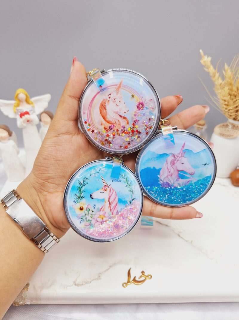 آینه شاین اکلیلی دایره ای طرح اسب تک شاخ به همراه آویز قفلی کد66007 - فروشگاه عمده لوازم آرایشی کالای سید