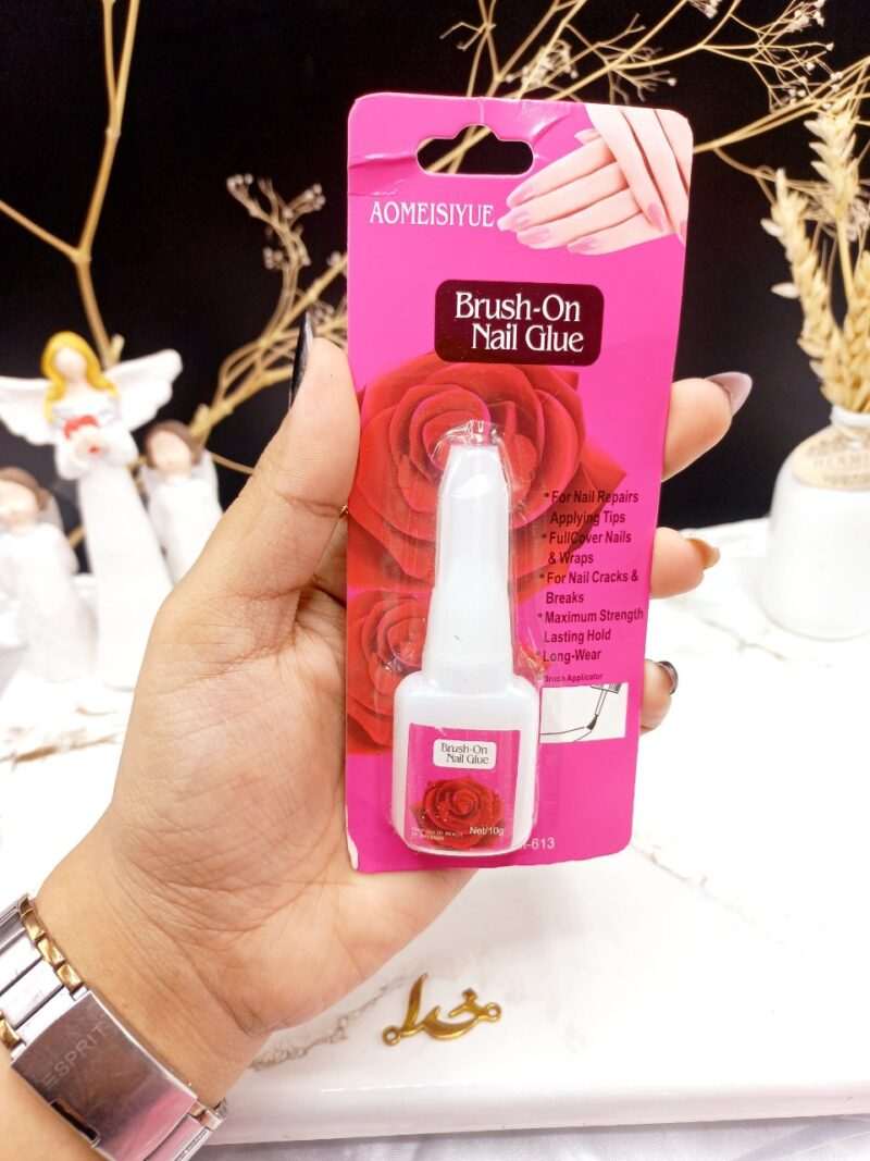چسپ ناخن فرچه دار برند Brush_On Nail Glue کد AM_613 - فروشگاه عمده لوازم آرایشی کالای سید