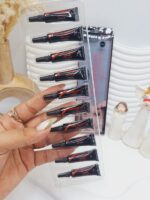 چسب مژه تکی برند Noor Alazawi حجم 1.5 گرم کد BX-3586 (کارتن مستطیل) - فروشگاه عمده لوازم آرایشی کالای سید