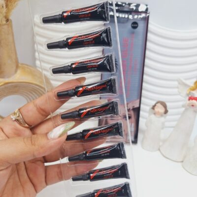 چسب مژه تکی برند Noor Alazawi حجم 1.5 گرم کد BX-3586 (کارتن مستطیل) - فروشگاه عمده لوازم آرایشی کالای سید